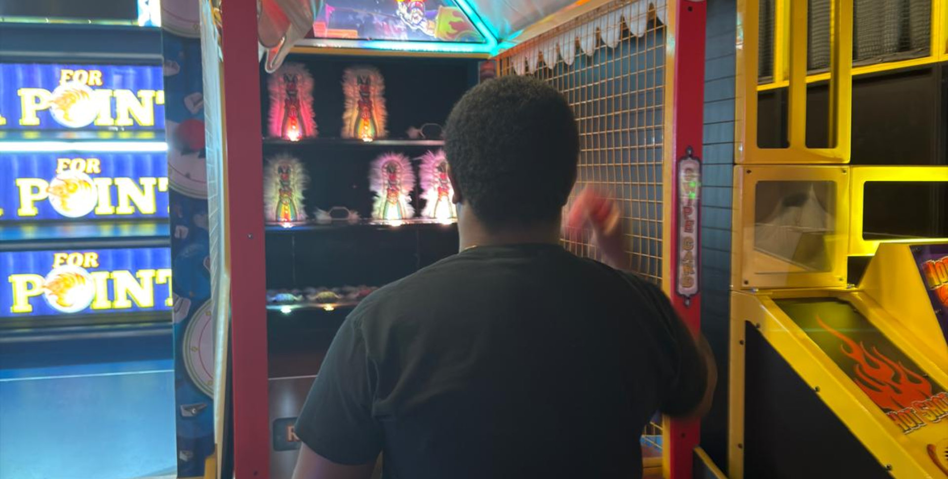 Man playing an arcade game