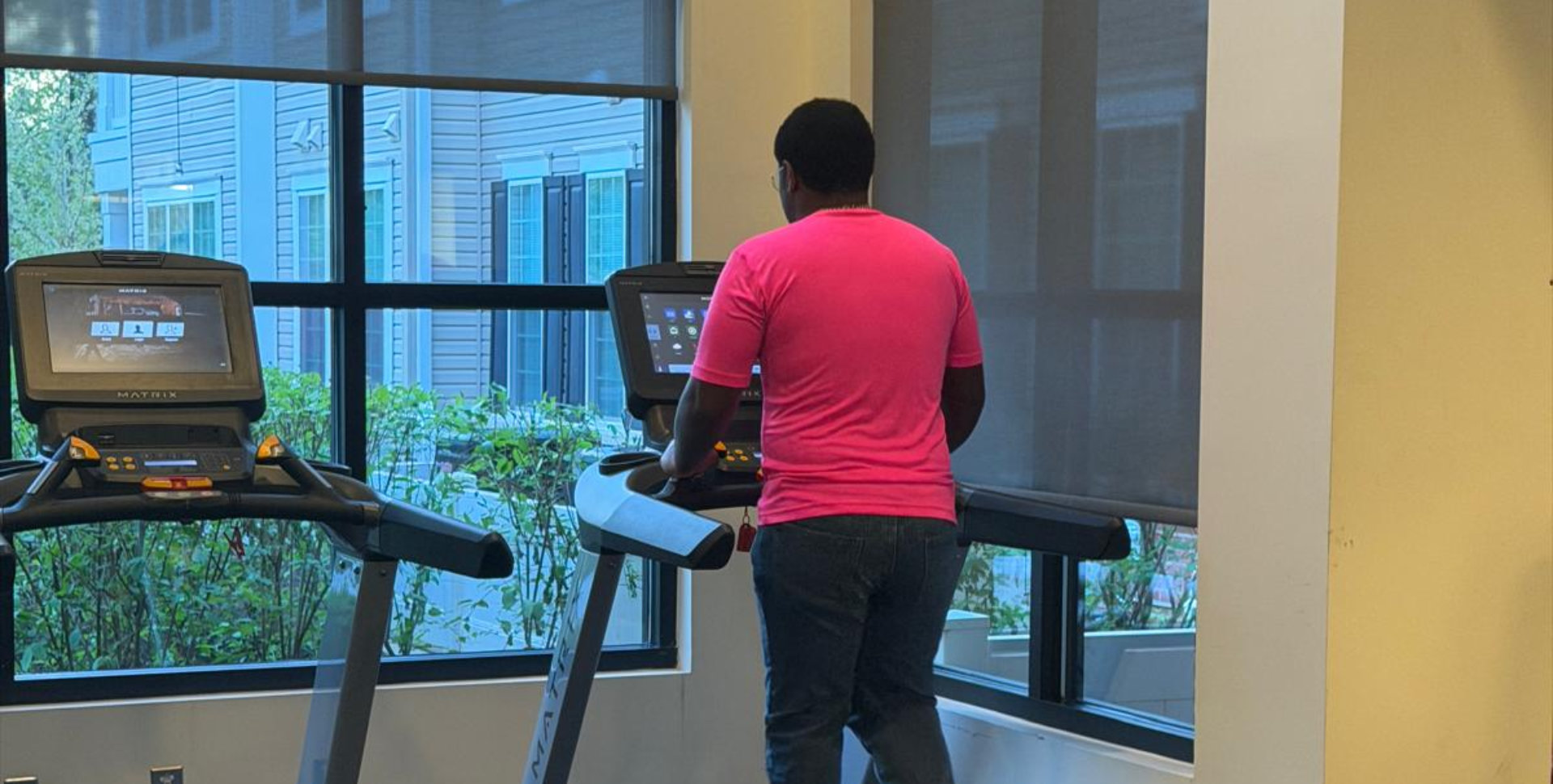 Man uses treadmill in the gym