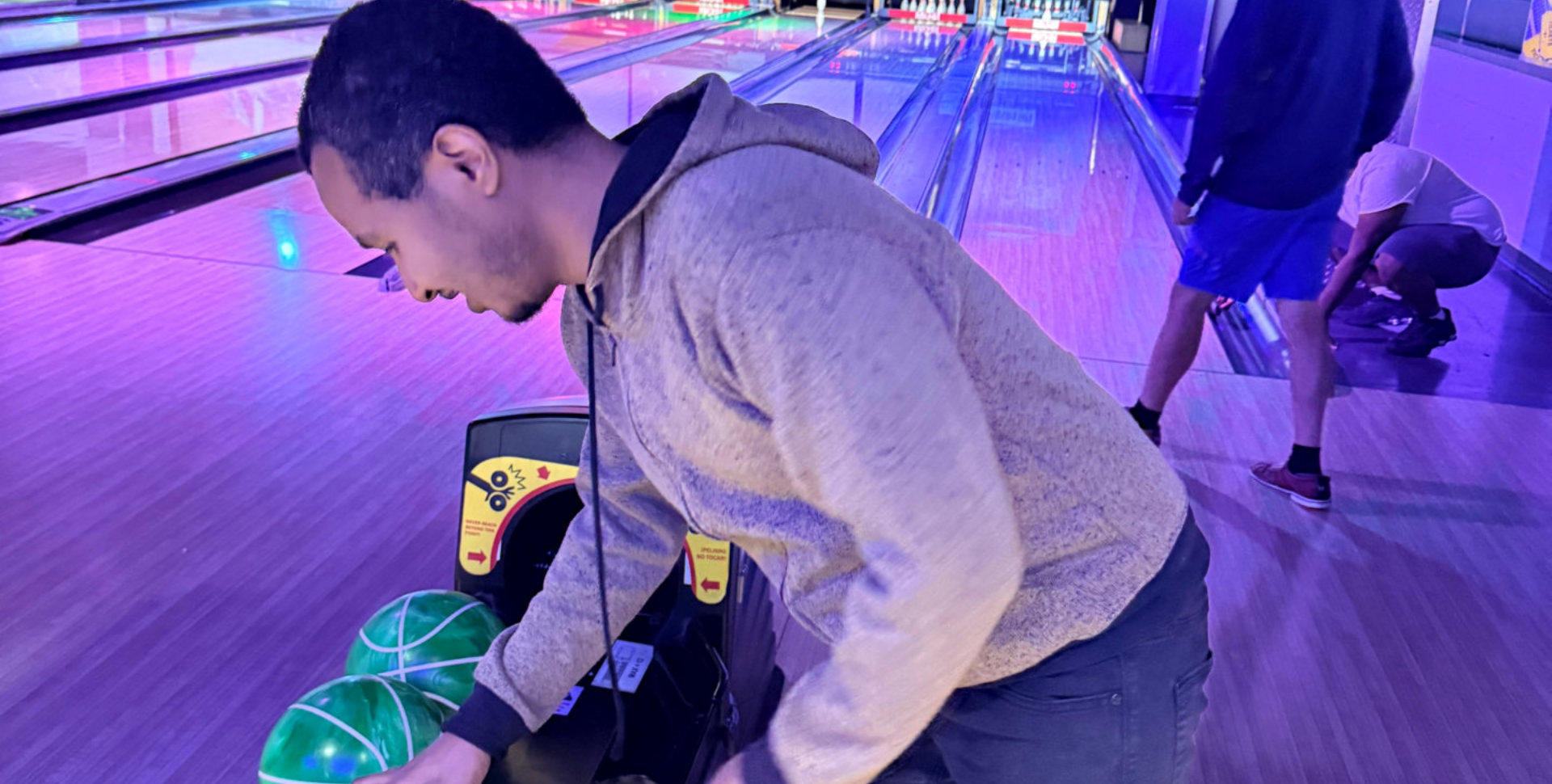 Men playing bowling